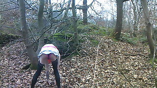 Carla poses and strips for pics in the forest